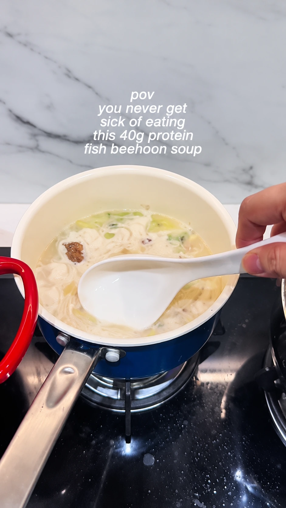 Fish soup simmering in a pot