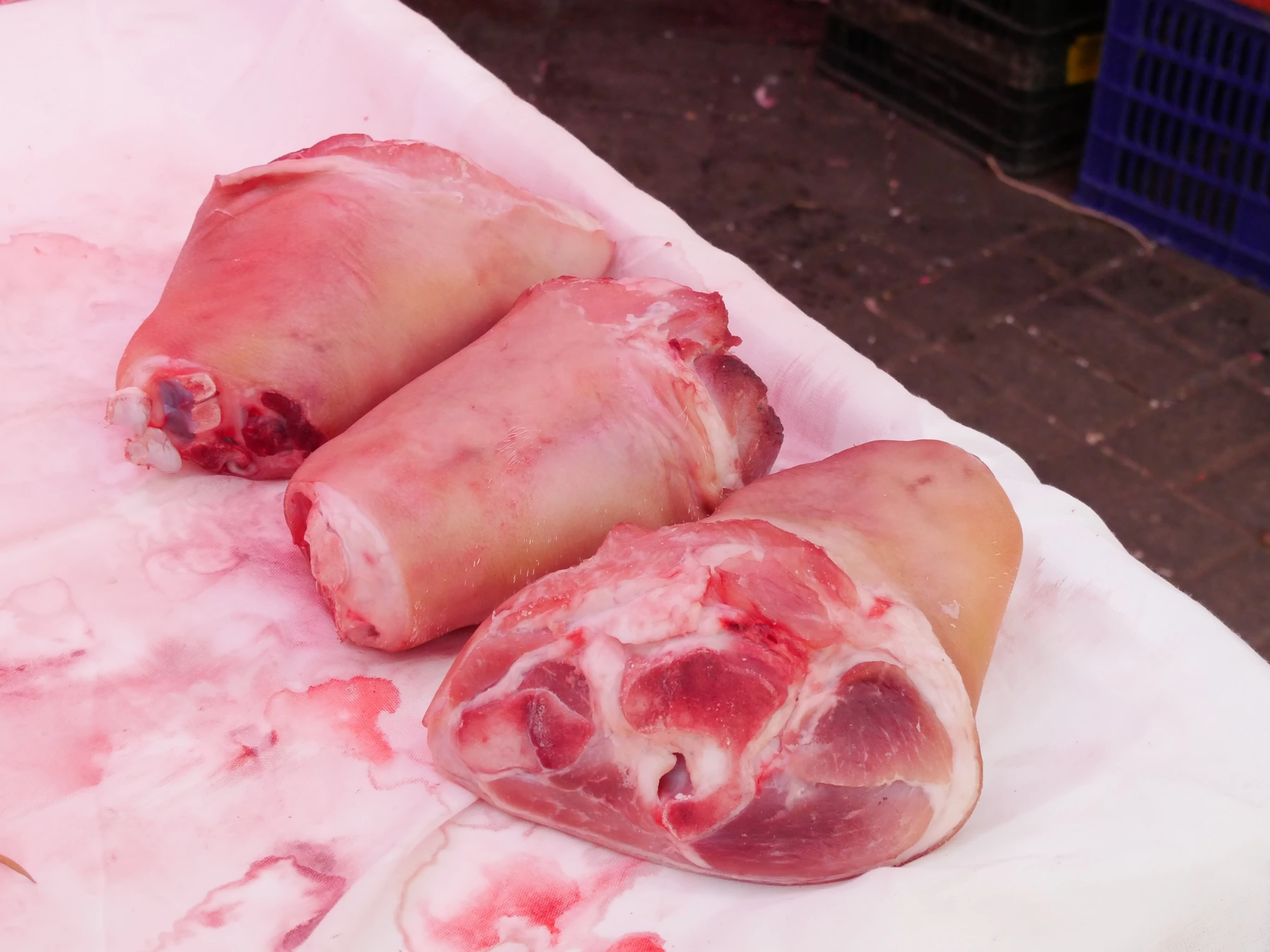 Pork knuckles displayed in a butcher shop